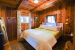 Rustic bedrooms with hotel-quality white linens 